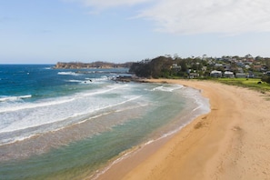 Enjoy the serene ocean views and tranquil atmosphere of this beachfront property.