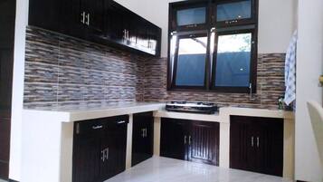 Fridge, stovetop, toaster, cookware/dishes/utensils