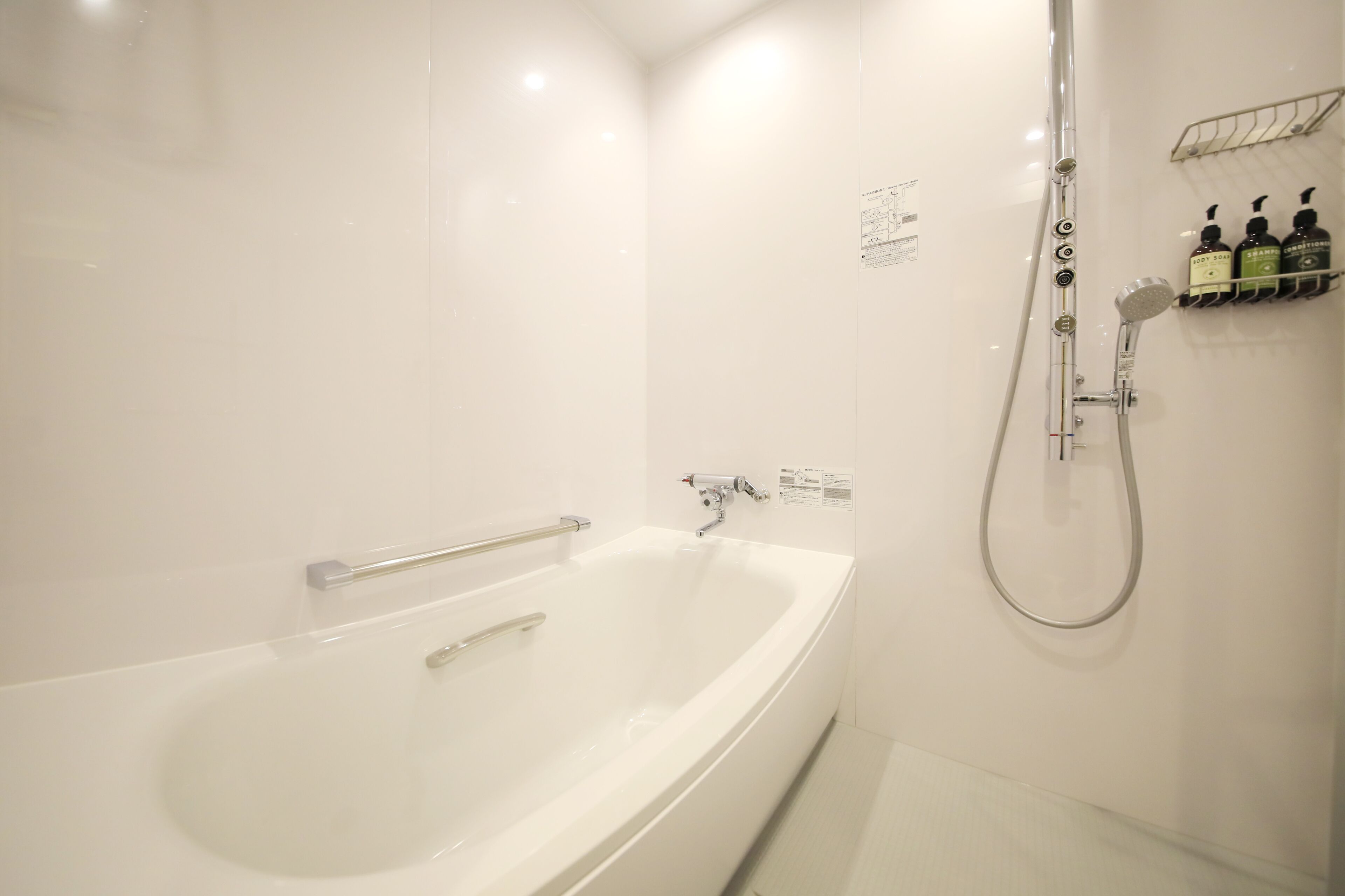 combined shower/bathtub, free toiletries, hair dryer, slippers