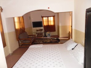 Desk, blackout curtains, free WiFi, bed sheets