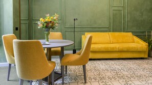 Luxury Suite | Living area | 50-inch flat-screen TV with satellite channels, TV - Vis Urban Suites & Spa (Bari)