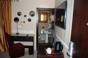 Ducha, toallas, jabón, shampoo