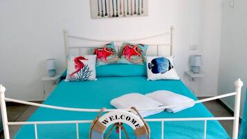 Triple Room (Beach) | Egyptian cotton sheets, premium bedding, minibar, desk