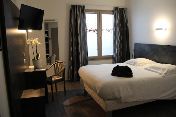 Premium bedding, memory-foam beds, desk, soundproofing