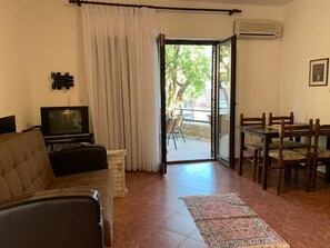 Comfort Apartment, 2 Bedrooms | Living room | 19-inch TV with cable channels - Apartments Petrovac (Petrovac)