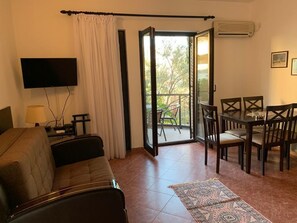 Classic Apartment, 2 Bedrooms | Living room | 19-inch TV with cable channels - Apartments Petrovac (Petrovac)