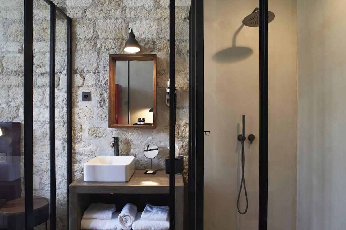 separate bathtub and shower, hair dryer, bathrobes, slippers