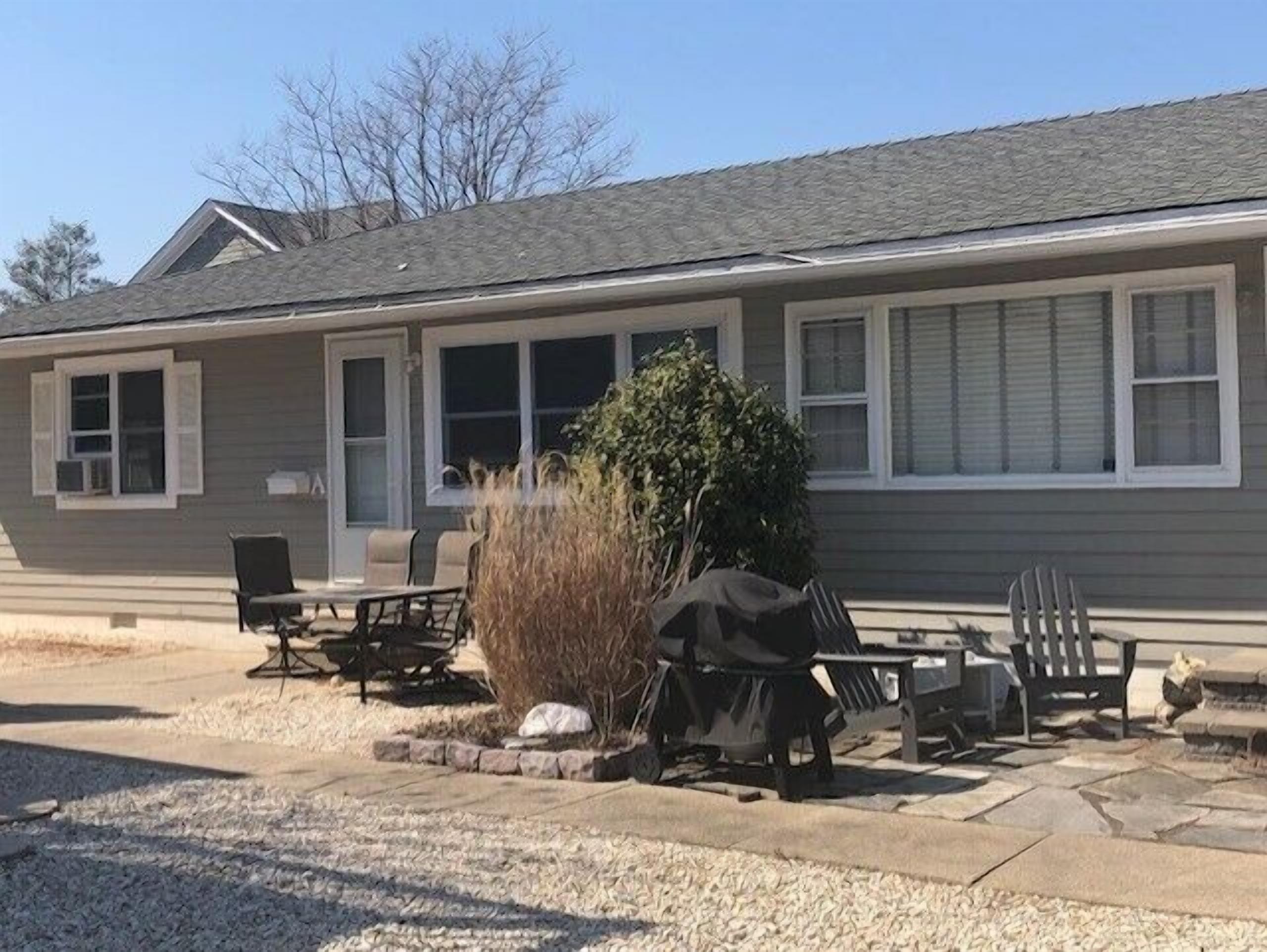 Great location.  This ranch style duplex features two bedrooms and one bath.  Window air conditioning and nice patio with gas grill, table and chairs.  Off street parking.   Just a short stroll to the beach and all that Stone Harbor has to offer!  Pe