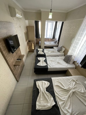 Classic Quadruple Room | Premium bedding, desk, laptop workspace, soundproofing - Denizhan Otel (Antalya)