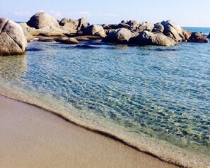 On the beach, sun loungers