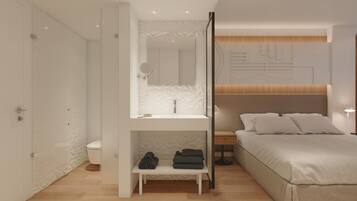 Un dormitorio moderno con cama, mesita de noche y armario empotrado con espejo.