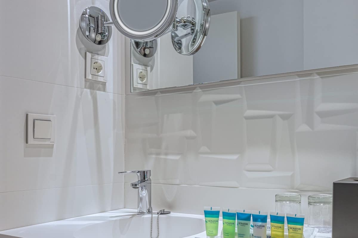 shower, eco-friendly toiletries, hair dryer, towels