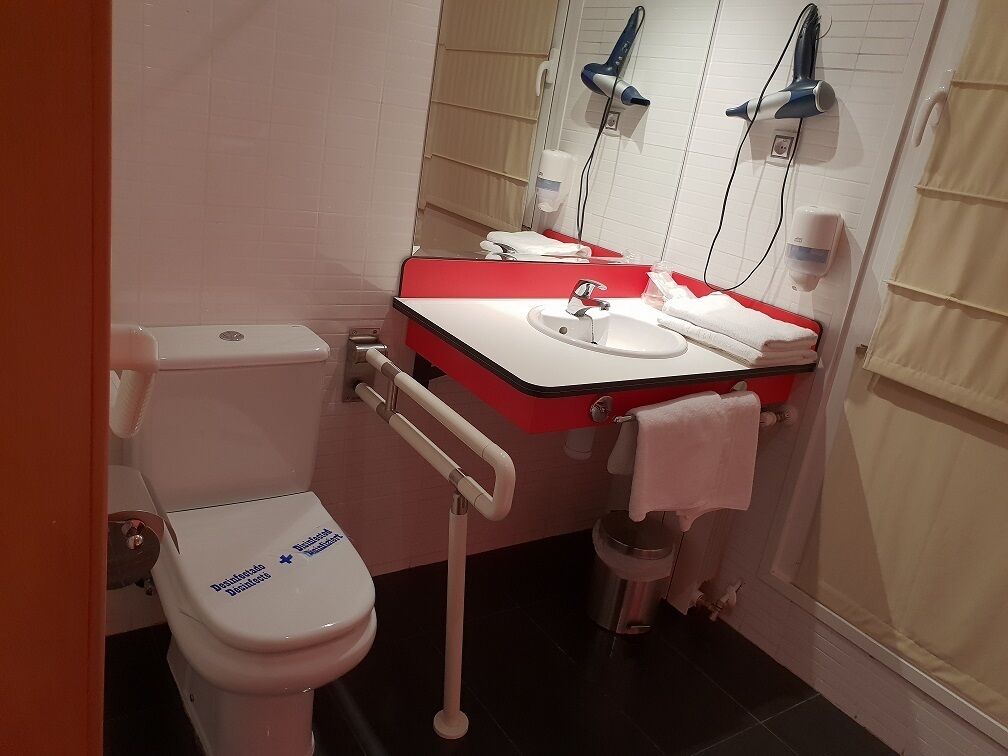 twin room, accessible | bathroom | shower, hair dryer, towels, soap