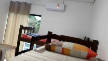 Family Room | Minibar, free WiFi, bed sheets