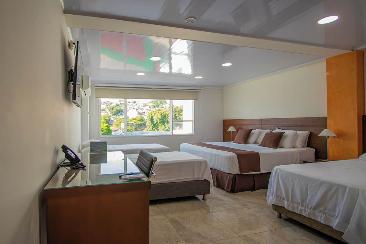Family Triple Room | In-room safe, desk, laptop workspace, soundproofing