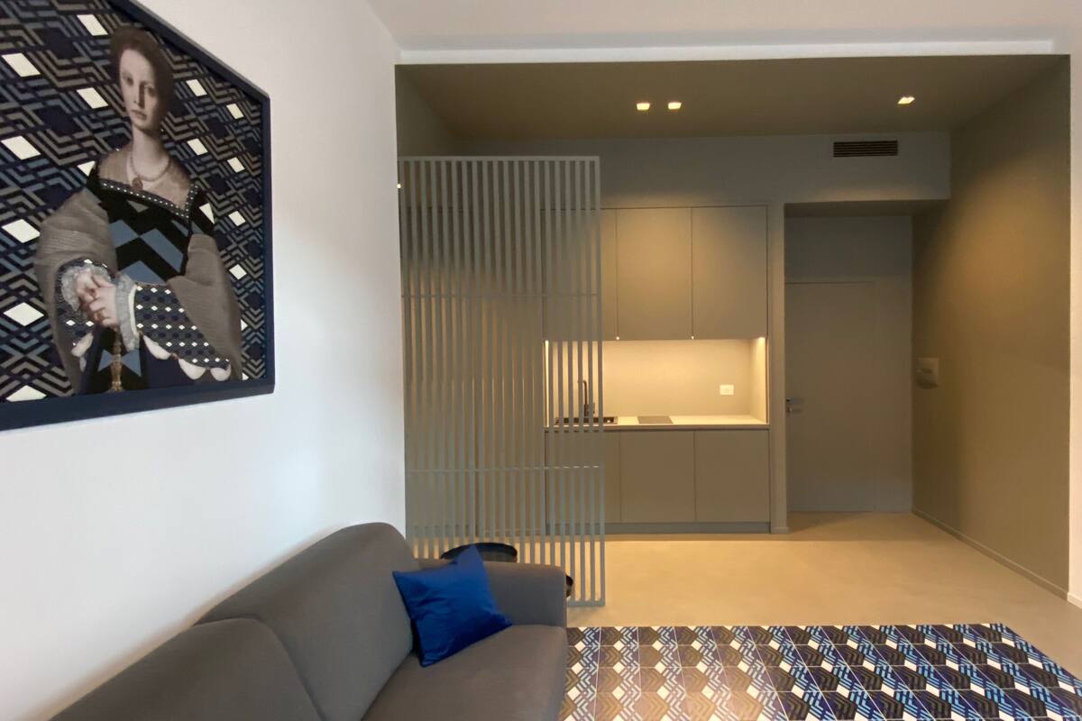 Condo Deluxe, 1 chambre | Aire de séjour | Téléviseur à écran plat de 42 po avec télévision par satellite