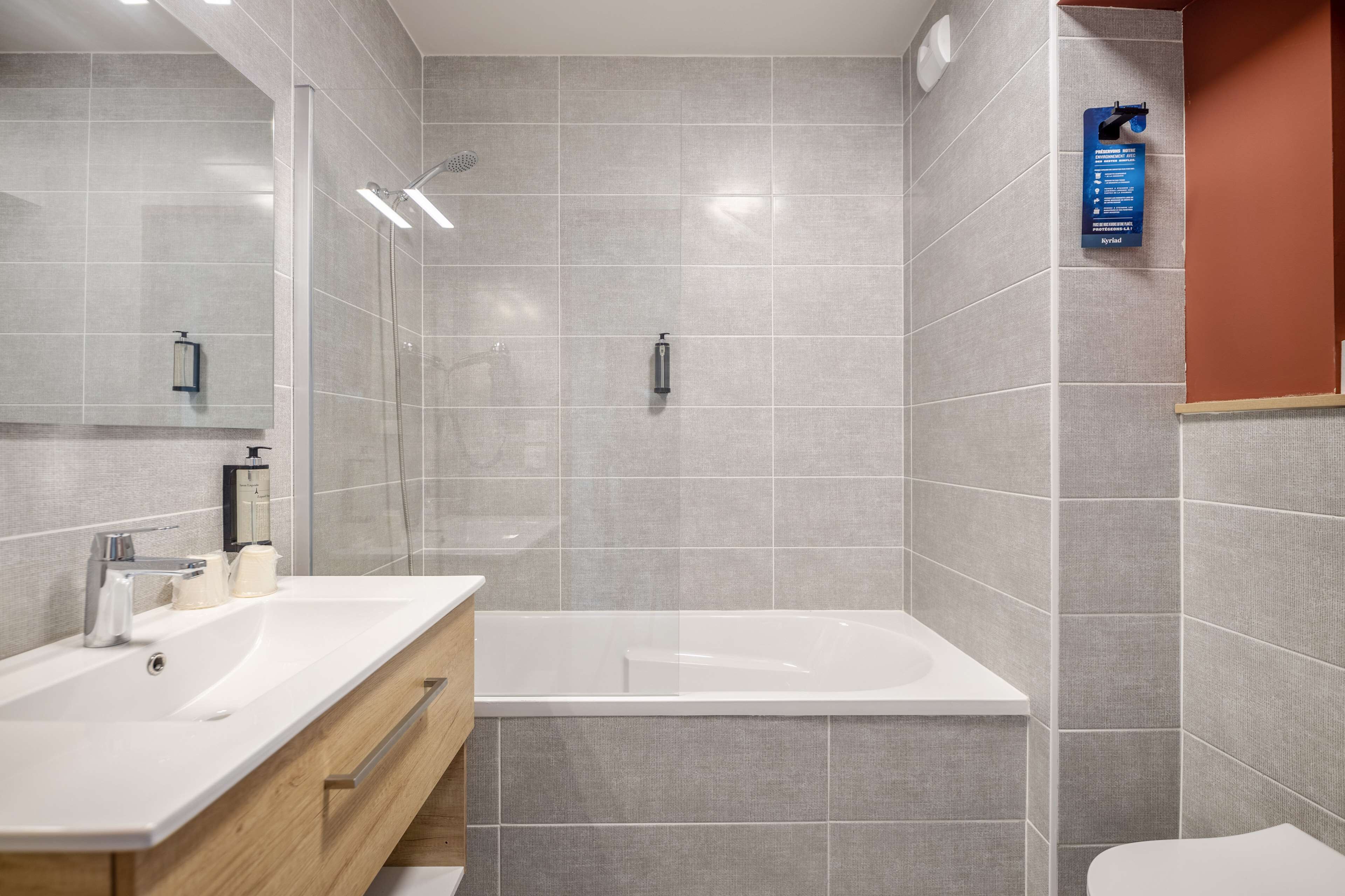 rainfall showerhead, eco-friendly toiletries, hair dryer, towels