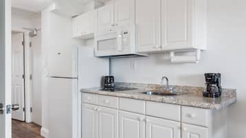 Fridge, microwave, coffee/tea maker, toaster