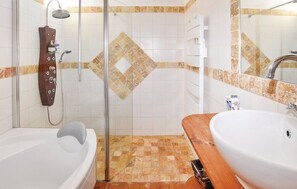 Bathtub, jetted bath, hair dryer, towels
