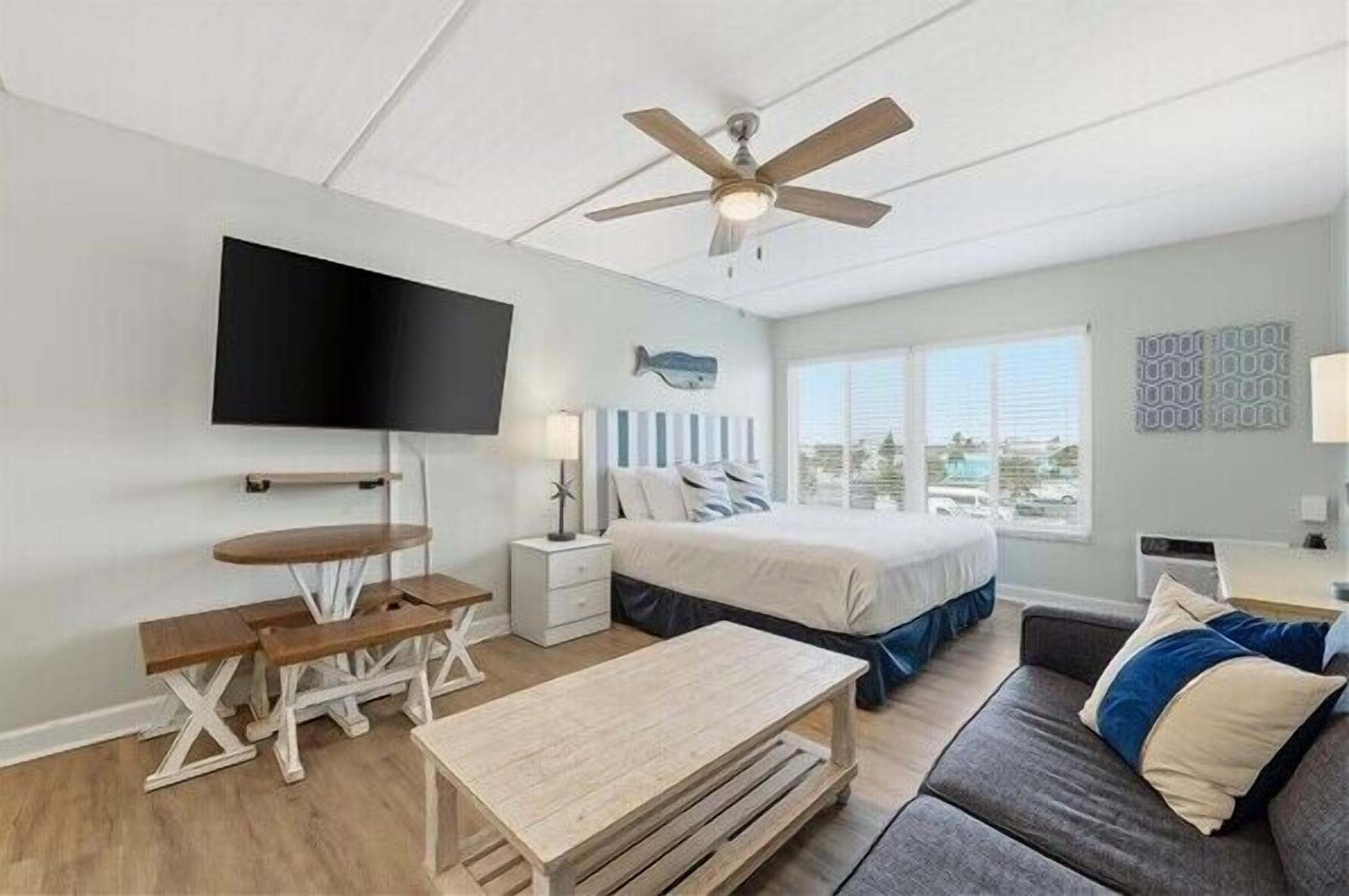 Tabla de planchar con plancha, wifi gratis y ropa de cama 