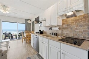 Fridge, microwave, stovetop, coffee/tea maker