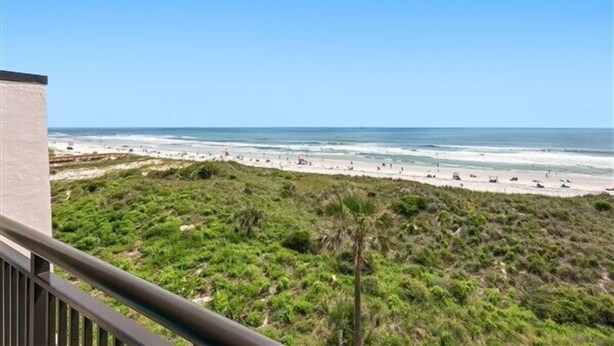 A beach view with a balcony overlooking the ocean and beach. - Beacher's Oceanfront Balcony Suite with Onsite Front desk and staff (St. Augustine)