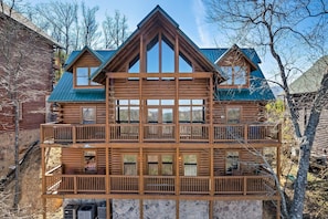 Enjoy the expansive views from the upper floor balcony and relax in the comfort of this cozy cabin.
