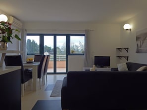 Comfort Apartment, Sea View | Living area | Flat-screen TV