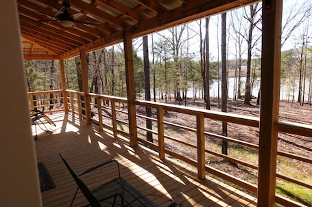 Terrace/patio. Lakeside luxury cabin on 125 acres. 20 min to MSU - Sleeps 6