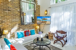 Condo, 1 habitación | Sala de estar | Televisión y reproductor de DVD