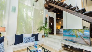 Condo, 2 Bedrooms | Living room | TV - Royal Palms 5 2 Bedroom Condo by RedAwning (Playa del Carmen)