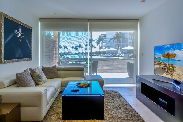 Condo, 2 Bedrooms | Living area | 30-inch TV with cable/satellite channels