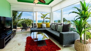 Condo, 2 Bedrooms | Living area | 30-inch TV with cable channels - Elements Penthouse 1 2 Bedroom Condo by RedAwning (Playa del Carmen)
