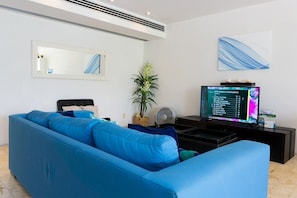 Condo, 2 Bedrooms | Living area | TV - Magia Playa 202 F 2 Bedroom Condo by RedAwning (Playa del Carmen)