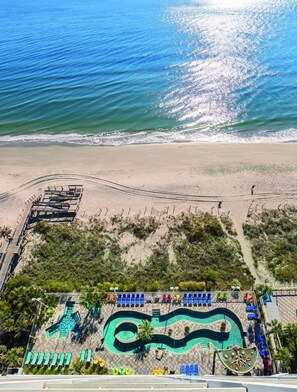 On the beach, sun-loungers, beach towels