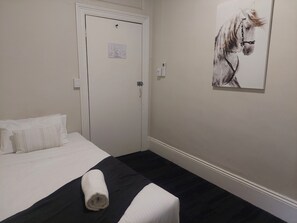 Eenpersoonskamer, gemeenschappelijke badkamer | Gratis wifi, beddengoed