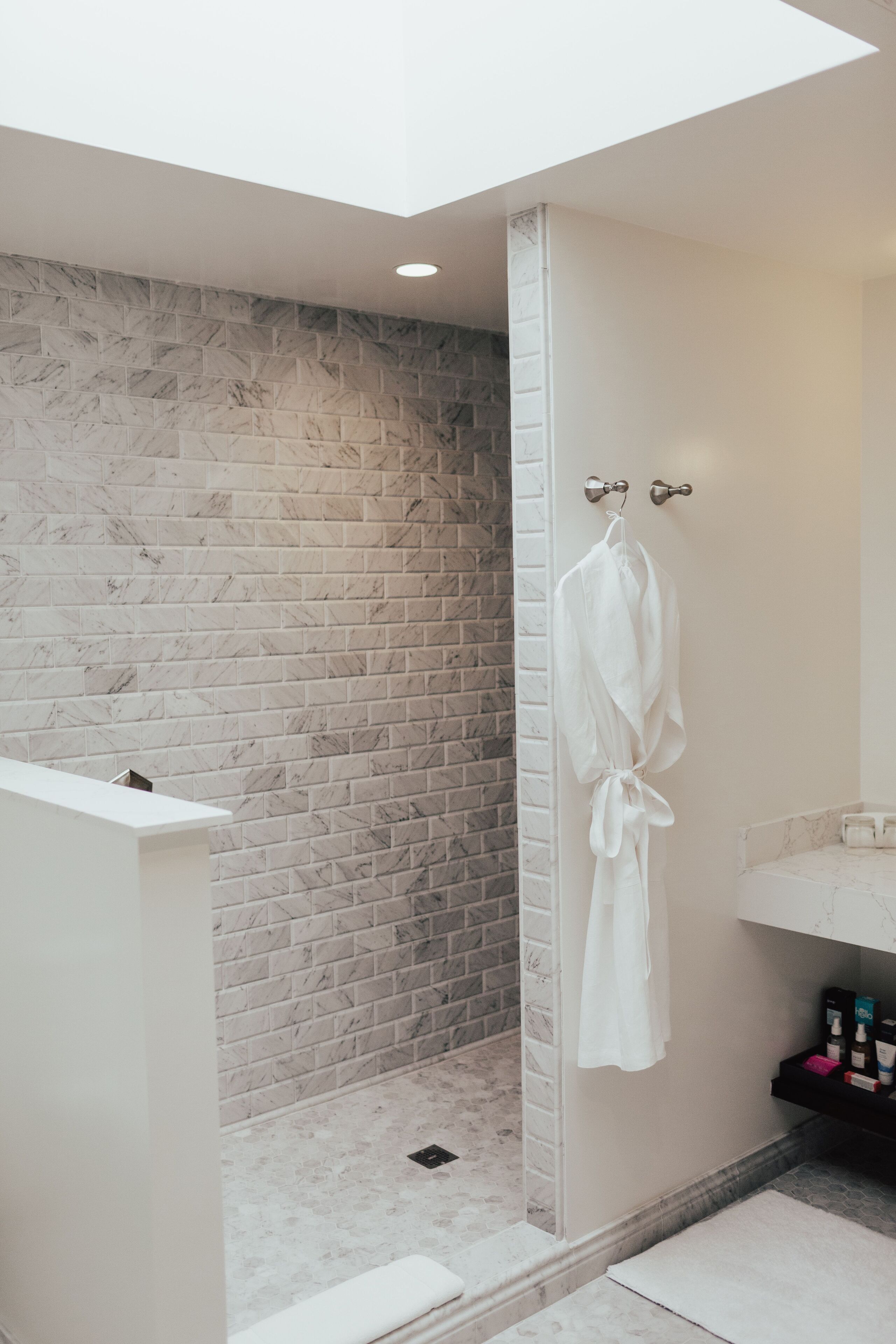 clocktower suite | bathroom | shower, hair dryer, bathrobes, slippers