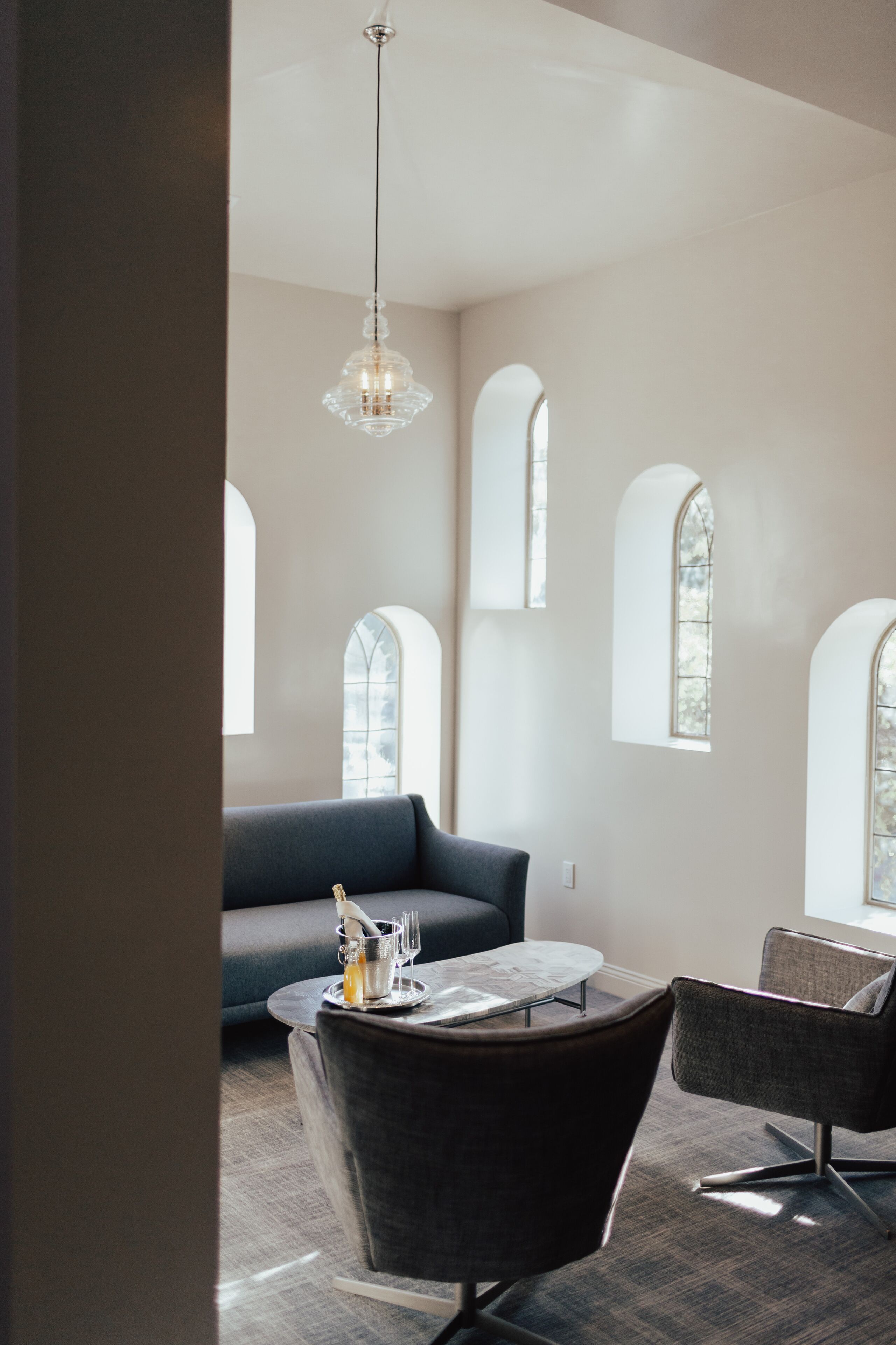 Clocktower Suite | Living area | 50-inch flat-screen TV with cable channels, TV