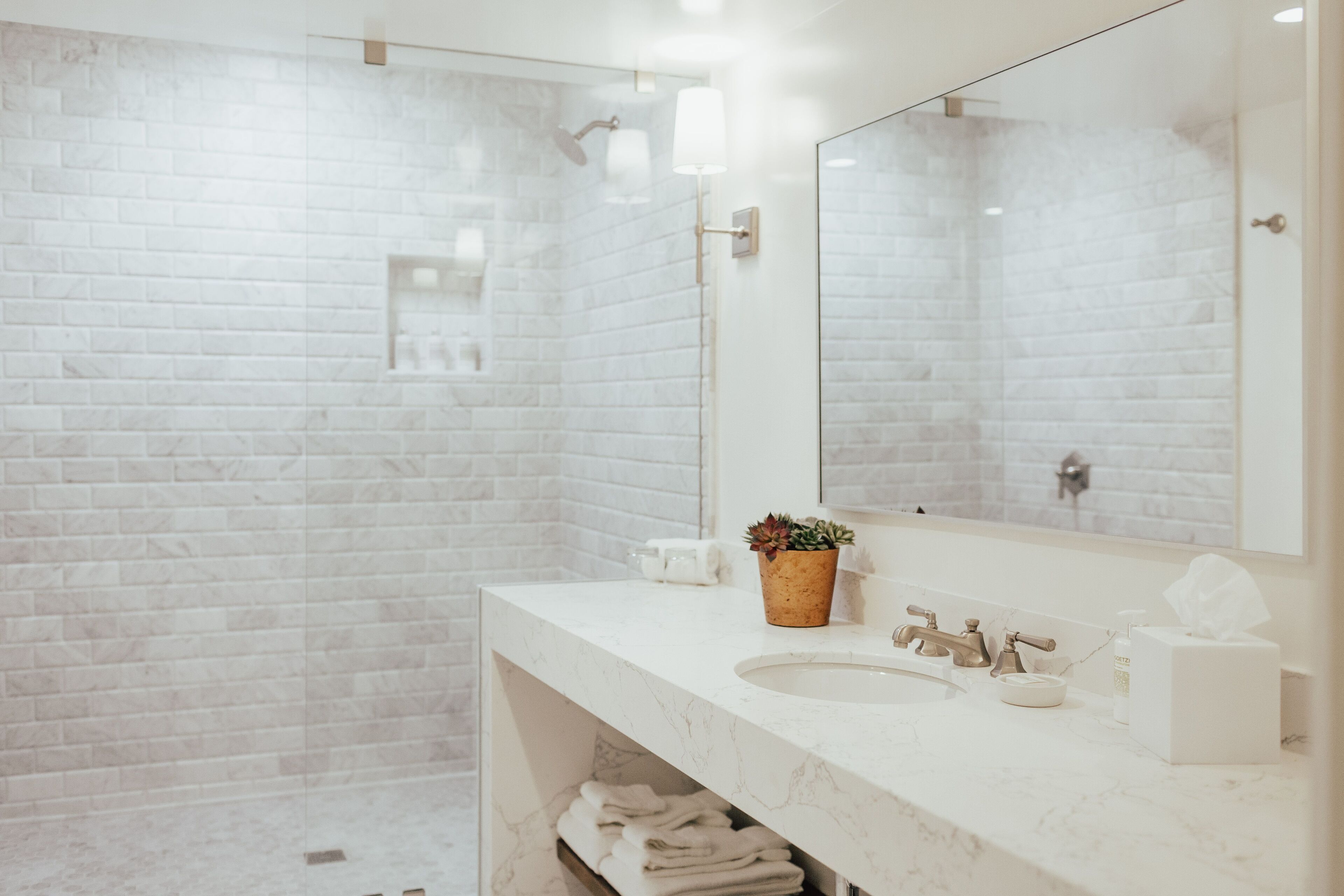 shower, hair dryer, bathrobes, slippers