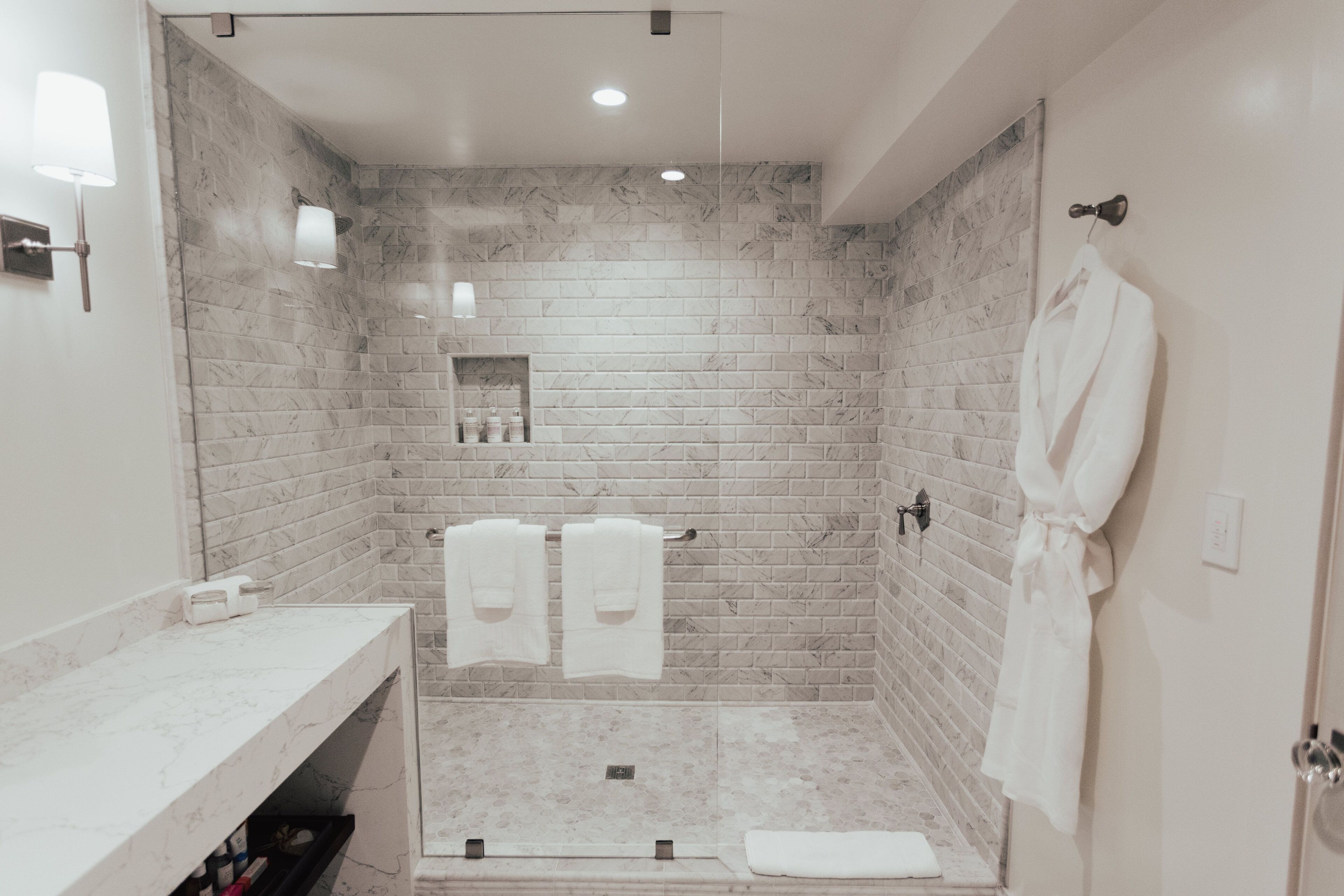 shower, hair dryer, bathrobes, slippers