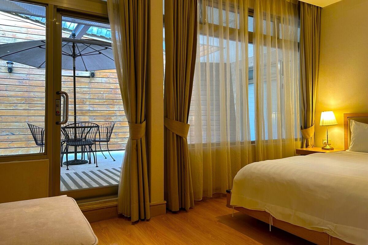 family quadruple room (611) | down duvets, blackout curtains, free wifi, bed sheets