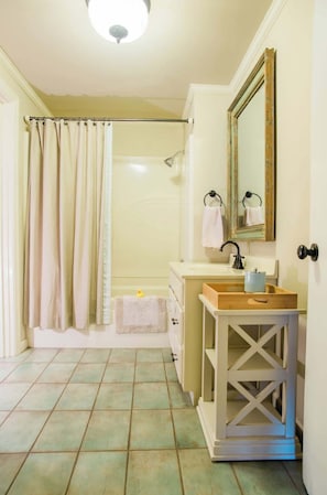 Combined shower/tub, hair dryer, towels, toilet paper