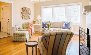 TV, fireplace, books