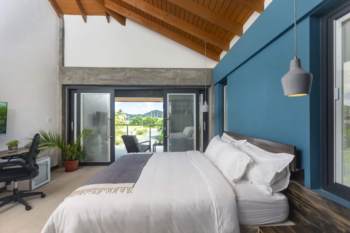 King Room with Balcony | In-room safe, desk, laptop workspace, iron/ironing board
