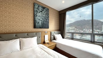 Family Room, Bathtub | Individually furnished, desk, blackout curtains, soundproofing