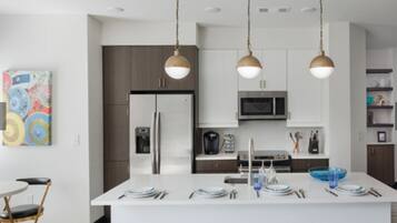 Superior Condo | Private kitchen | Full-sized fridge, microwave, oven, stovetop