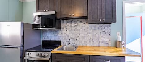Room 8 - (3) Doubles and a kitchenette | 1 bedroom, iron/ironing board, free WiFi, bed sheets