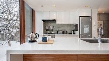 Villa, 4 Bedrooms | Private kitchen | Fridge, microwave, dishwasher, coffee/tea maker