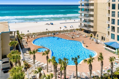 Discover Panama City Beach from this cozy condo w/ shared pools & fitness center