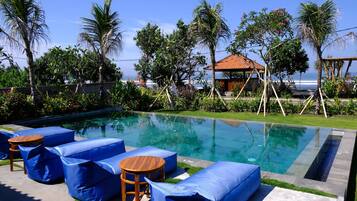 2 outdoor pools, open 7:00 AM to 8:00 PM, pool umbrellas, pool loungers